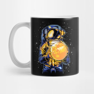 astronaut holding a moon Mug